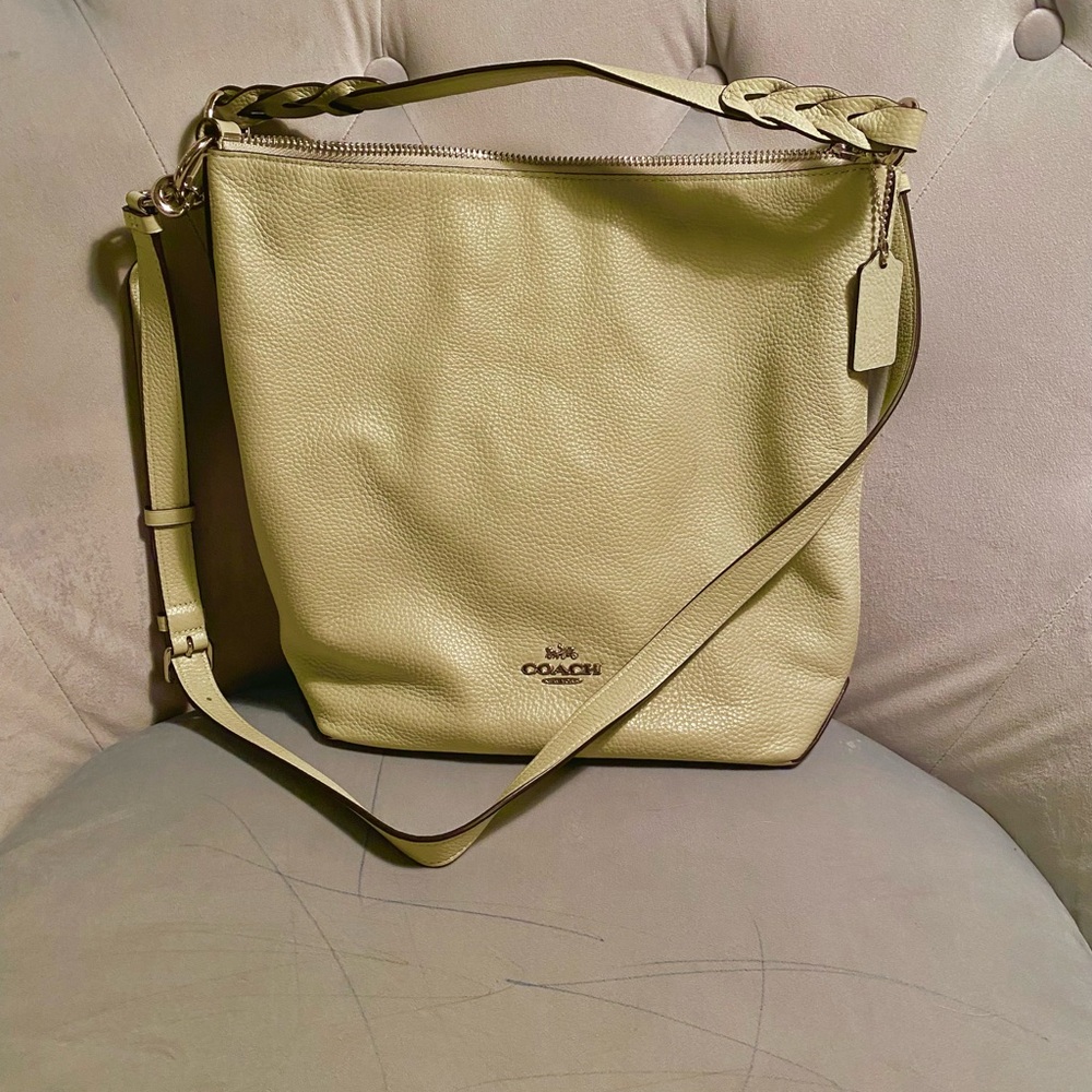 Coach pale green slouchy bucket bag